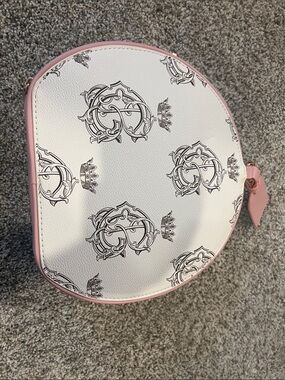 White and Pink Round Crossbody Bag with Monogram Print